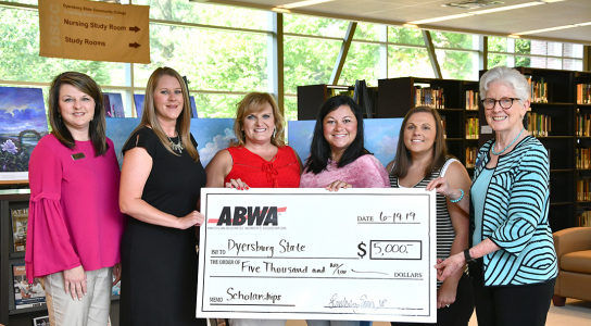 ABWA presents check to DSCC President Karen Bowyer