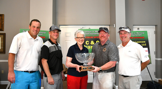 City of Newbern posing with their golf tournament trophy