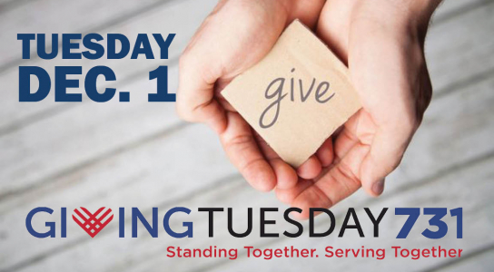 Giving Tuesday 731 image of hands holding a piece of paper that says give