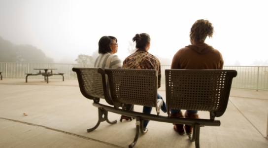 Students sitting on the deck at the Student Center