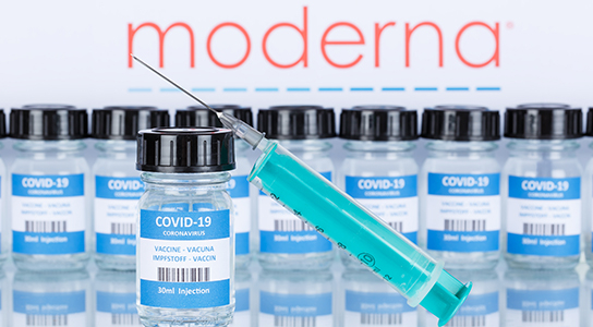 moderna vaccine bottle and syringe